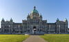 A picture of the BC Legislative Assembly beneath a bright blue sky 